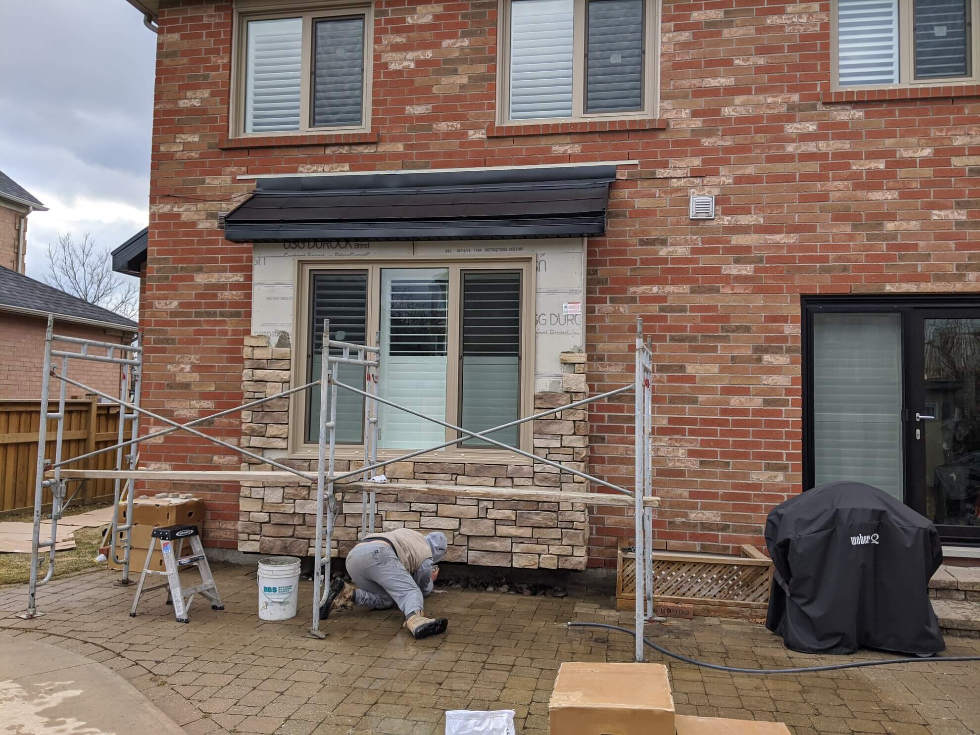 Brick home with restored front facade and new window lintel